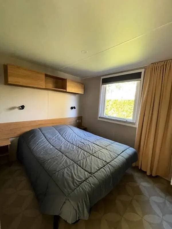 Foto 9 von 15: Mobilhome 3 chambres Camping Les Dunes de Contis