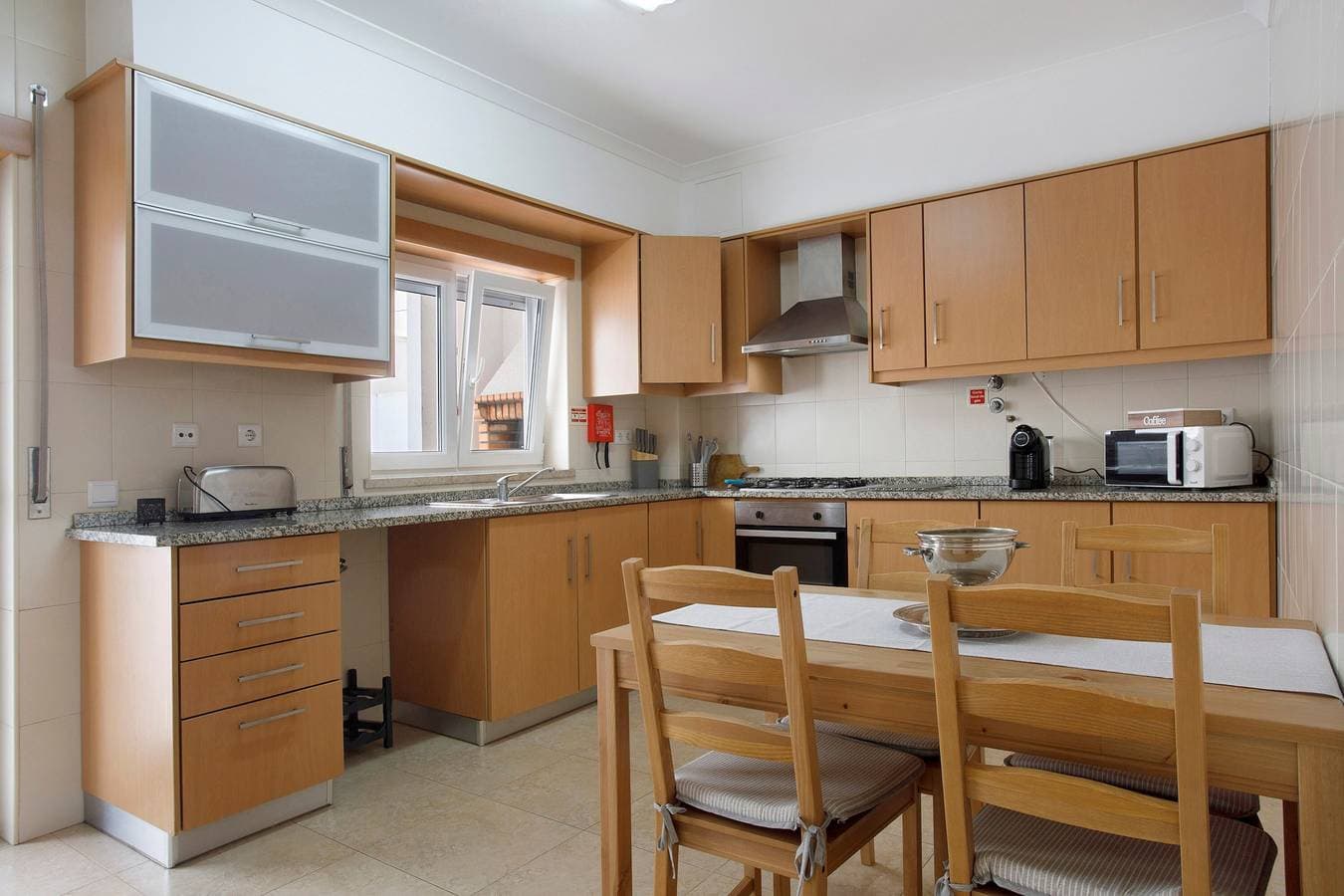Foto 4 von 19: Ferienhaus 'Tina House' mit privater Terrasse, WLAN und Klimaanlage