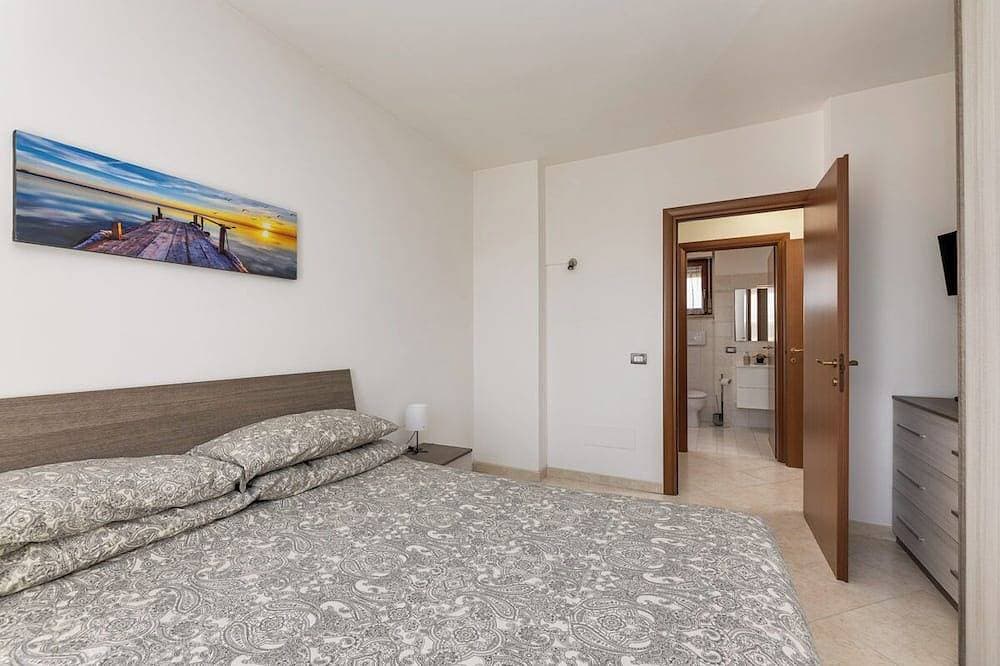 Foto 6 von 18: Casa Confortevole Terrazzo e Posto Auto Coperto!