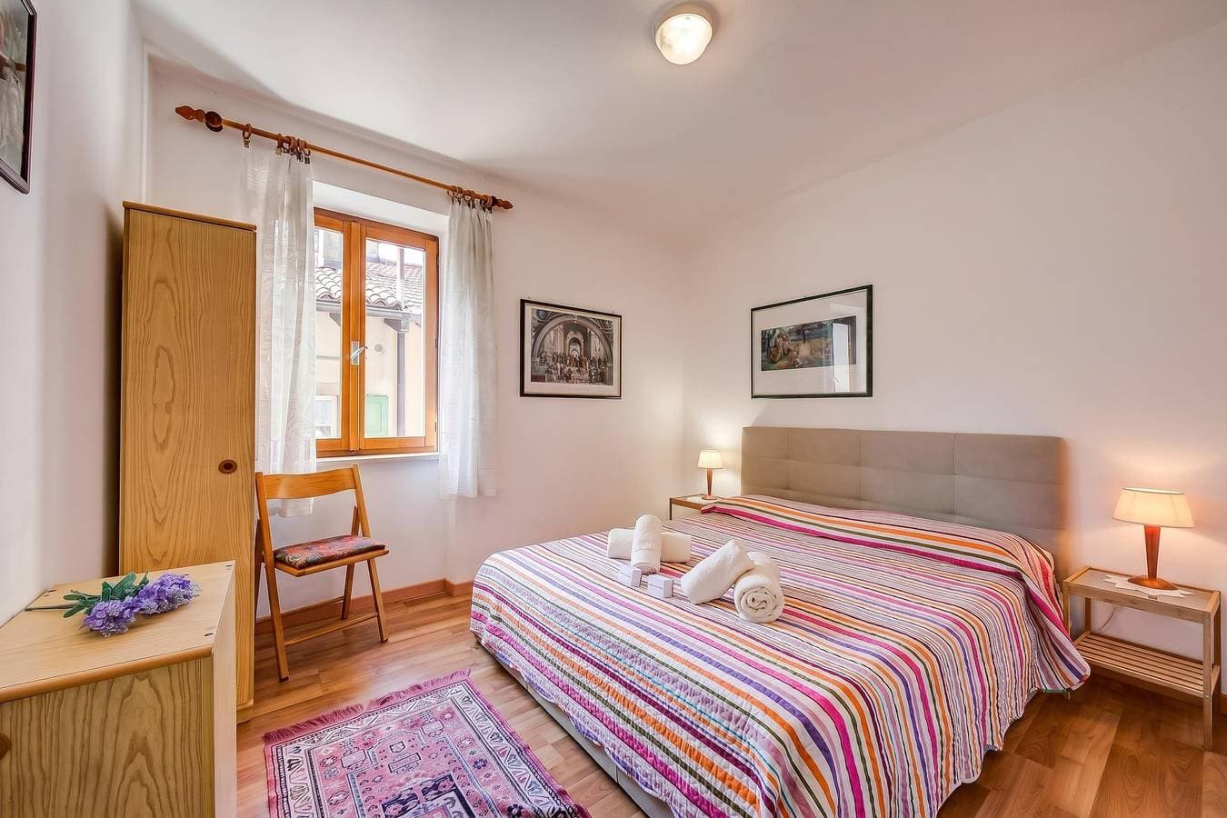 Foto 4 von 22: Appartamento Miorelli 2 - Apartment for 4