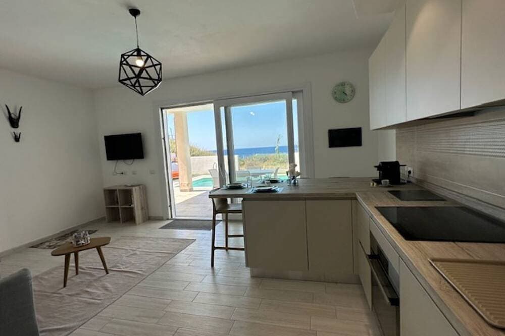 Foto 11 von 18: Villa Tramonto : Wohnung im Erdgeschoss mit direktem Meerblick
