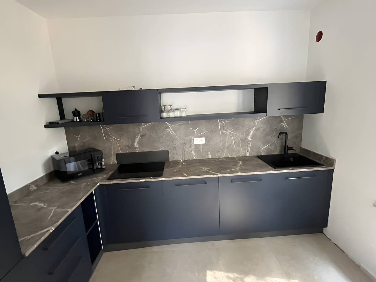 Foto 12 von 33: Apartment 'Il Casalino - Bilo 4' mit Bergblick, Gemeinschaftsgarten und Klimaanlage