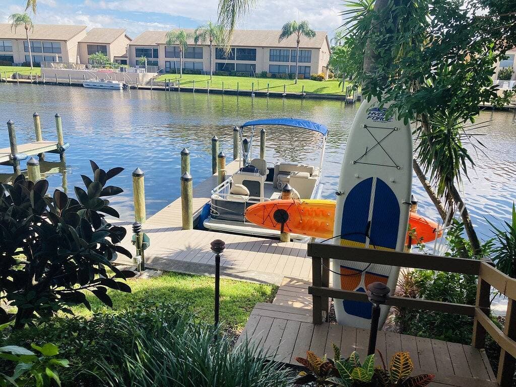 Enchanting tropical waterfront villa with boat slip, bikes, kayaks heated  pool! 1