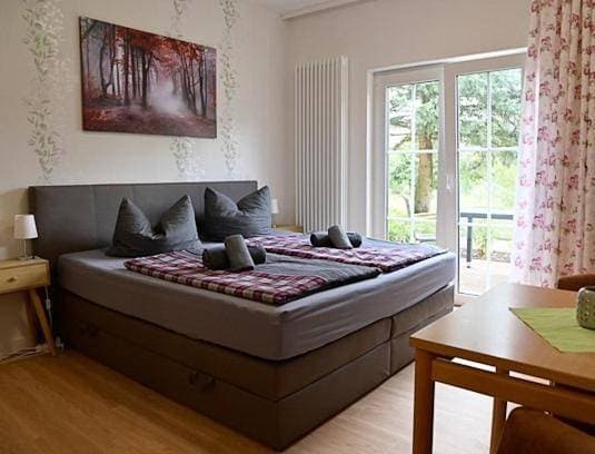 Foto 6 von 23: Double Room with Garden View