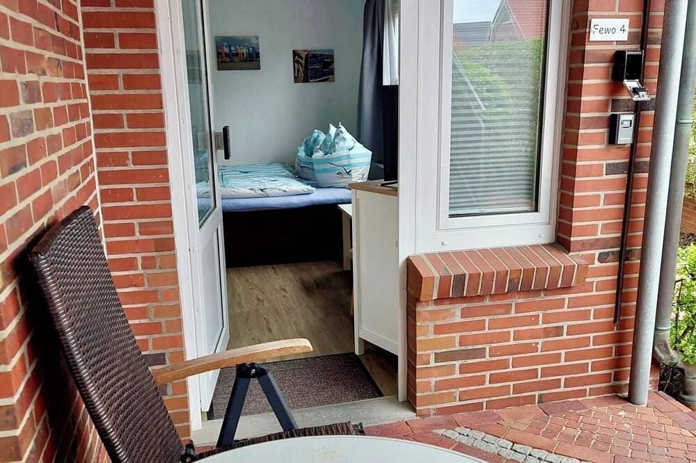 Foto 3 von 12: Daubs Inseloase – Apartment 4 mit Terrasse, tierfrei & strandnah