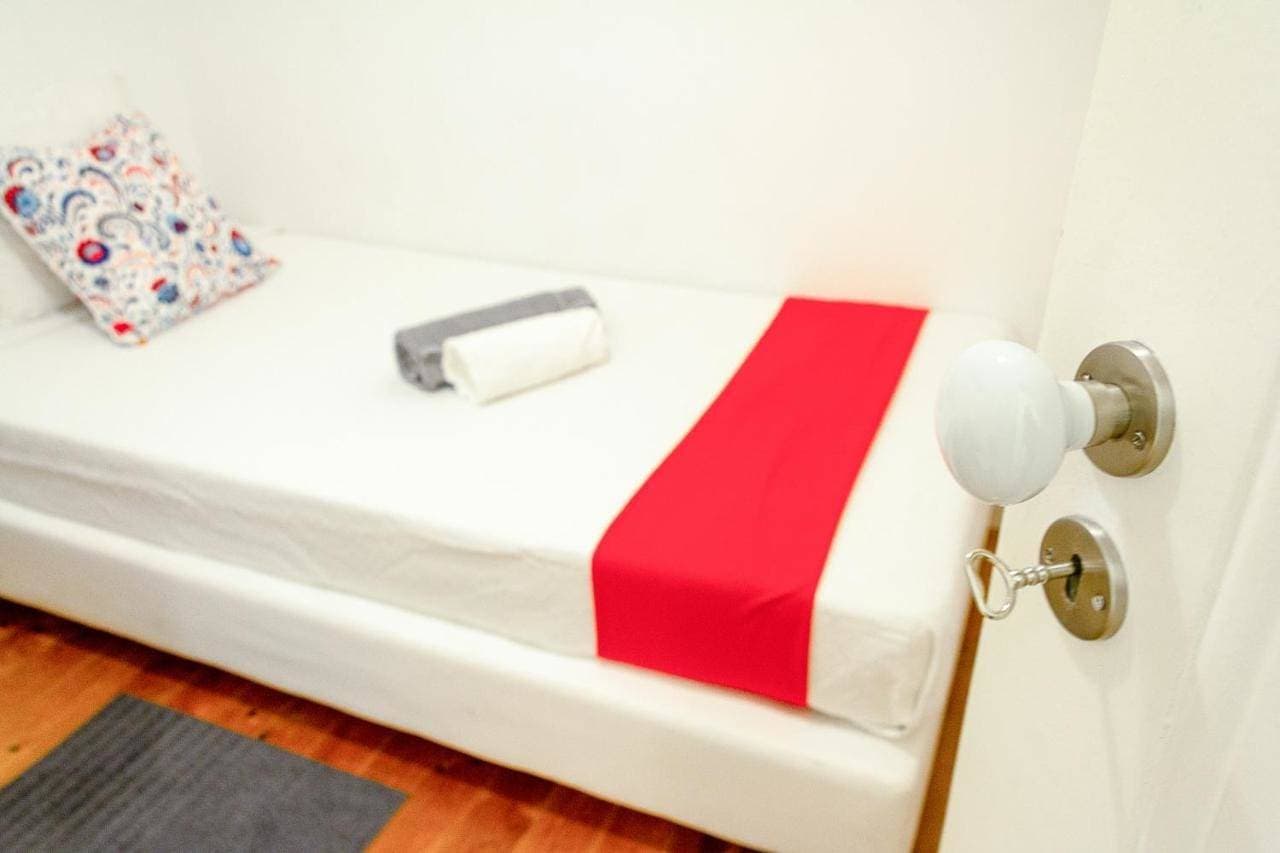Foto 5 von 41: Twin Room with Shared Bathroom