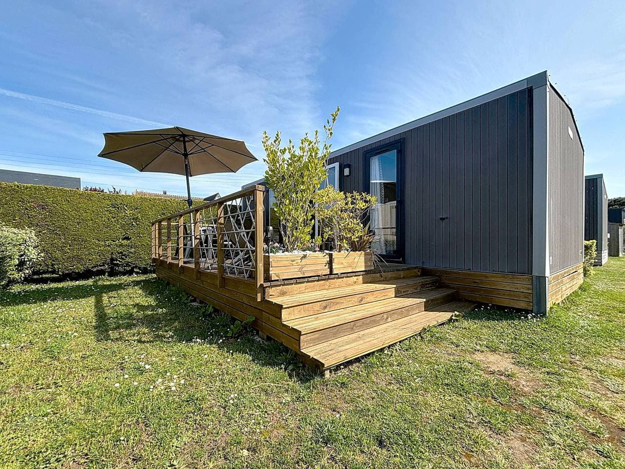 Foto 2 von 22: Mobil-Home Grand Confort, 4 Pers., 2 Ch., 2 SdB, Piscine Chauffée & Proche Mer