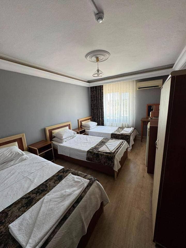 Foto 6 von 6: Triple Room