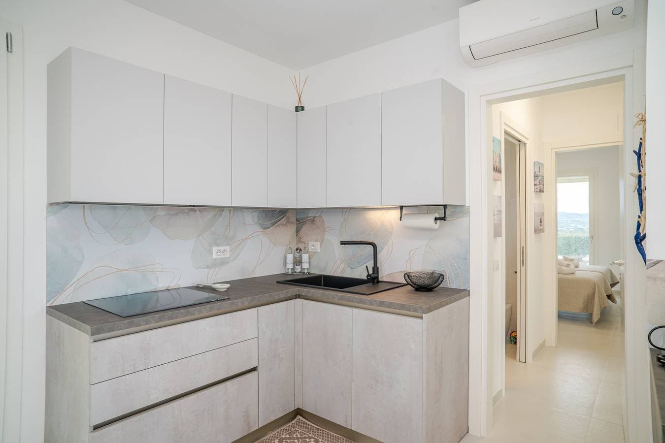 Foto 6 von 24: Ferienwohnung 'Smeraldo Apartment ' mit Meerblick, WLAN und Klimaanlage