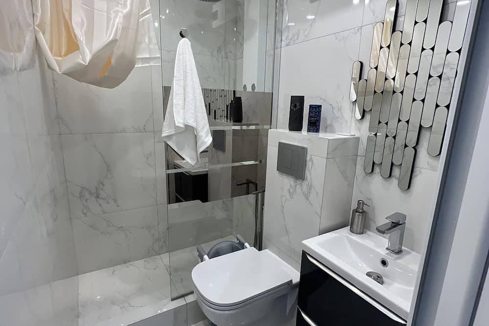 Foto 9 von 13: Maison Appartement Triplex Avec Jacuzzi et Sauna
