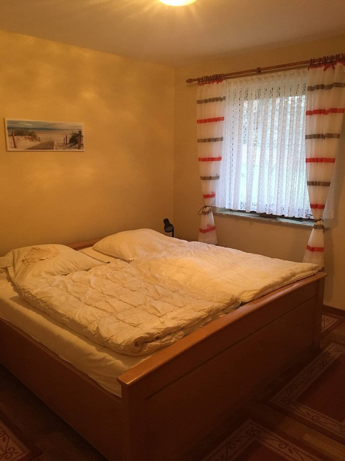 Foto 4 von 10: Ferienwohnung 'Seewind' mit Gemeinschaftsterrasse und Garten