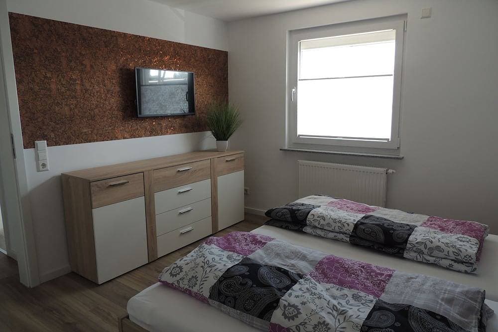 Foto 3 von 12: Moderne Ferienwohnung 1Og