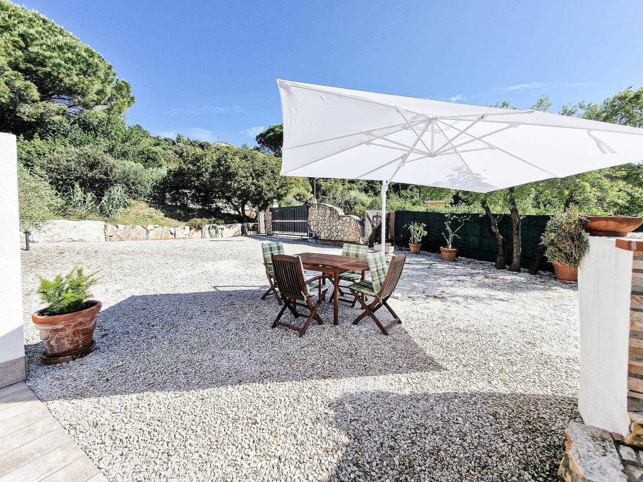 Foto 5 von 26: Ferienhaus 'Pettirossi' mit gemeinsamem Garten, WLAN und Klimaanlage
