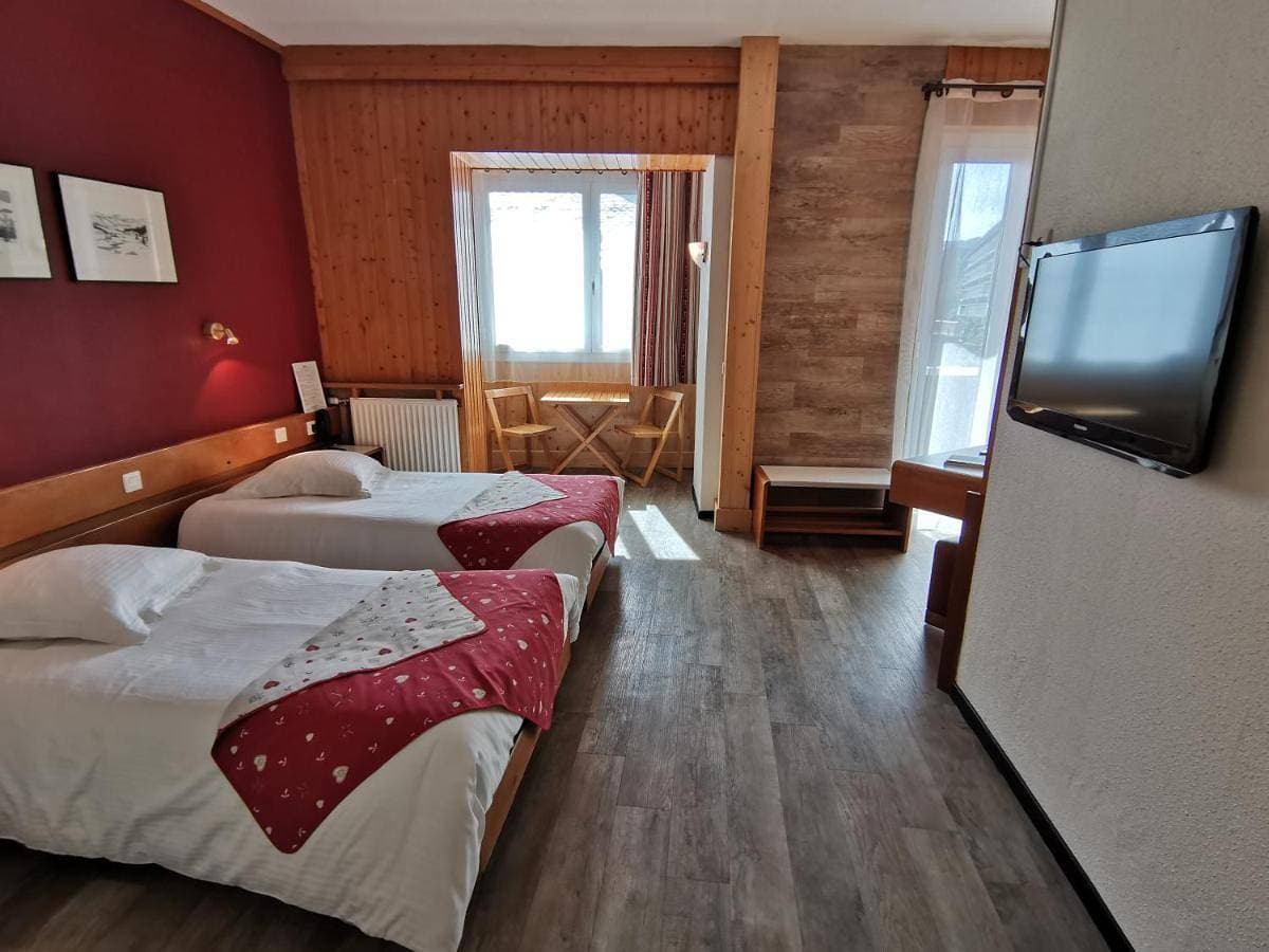 Foto 5 von 9: Quadruple Room