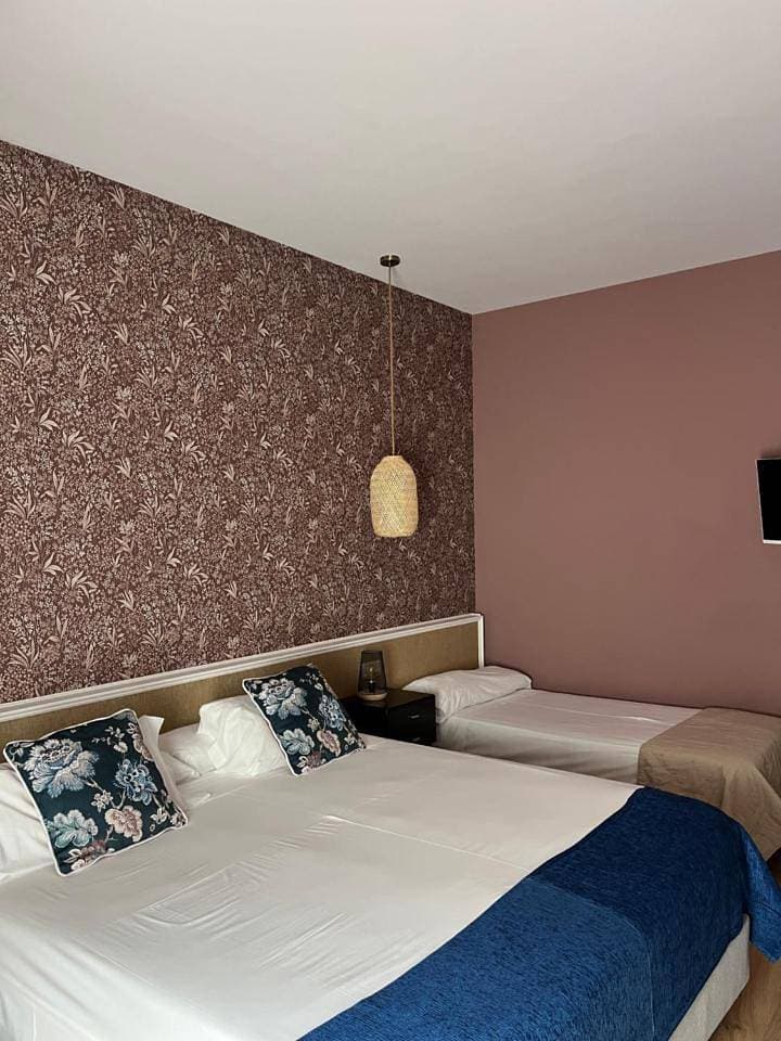 Foto 6 von 12: Superior Triple Room