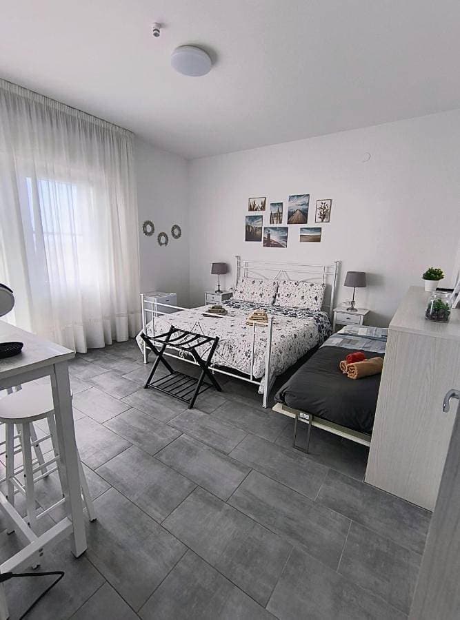 Foto 2 von 60: Double Room with Private Bathroom