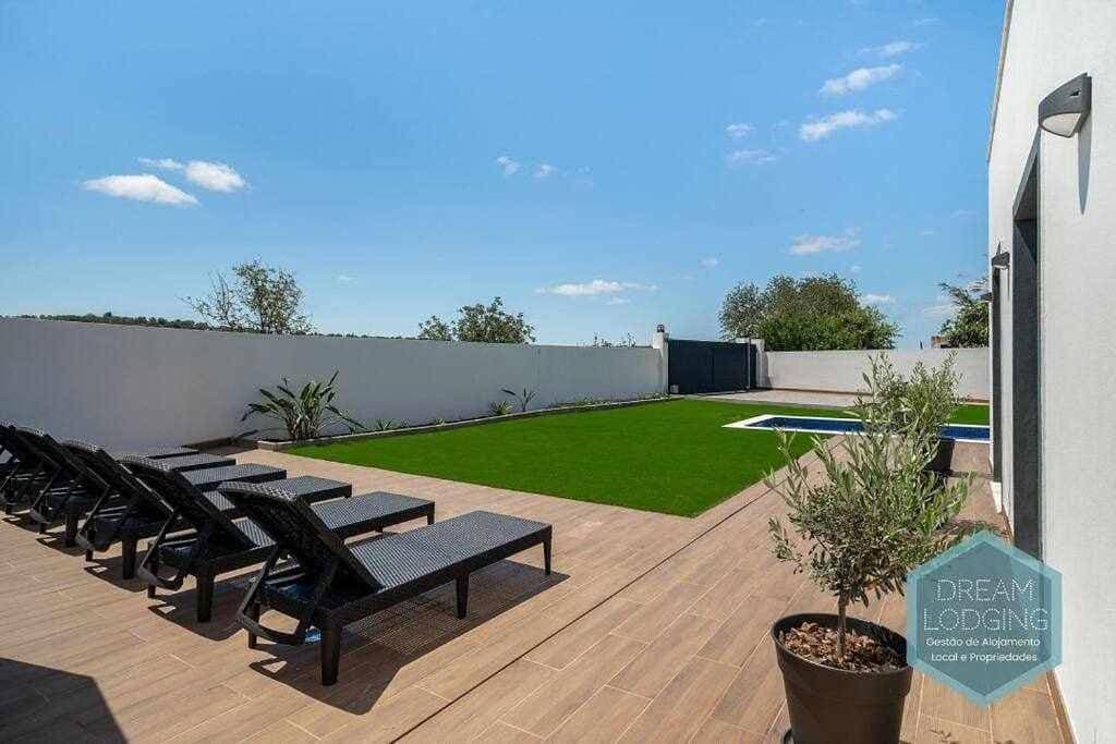 Foto 4 von 32: Three-Bedroom House
