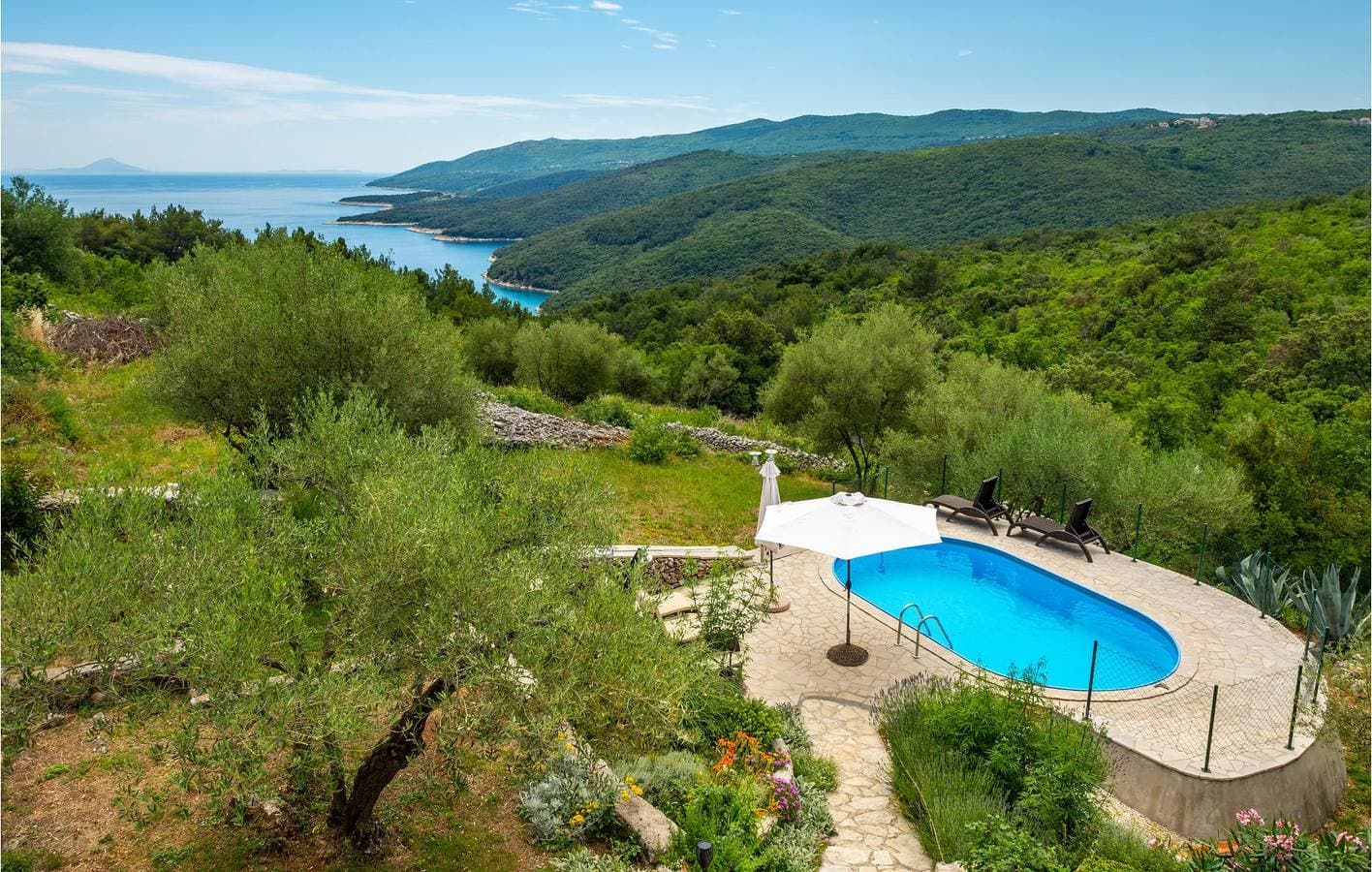 Foto 4 von 40: Apartment mit Meerblick, Pool, Terrasse und WLAN – 1000 m vom Strand entfernt