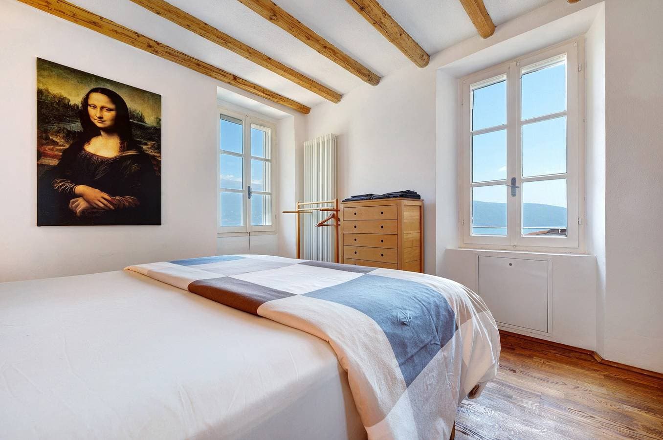 Foto 10 von 45: Ferienhaus 'Haus Mit Tollem See -und Bergblick' mit Seeblick, Privatem Pool und WLAN