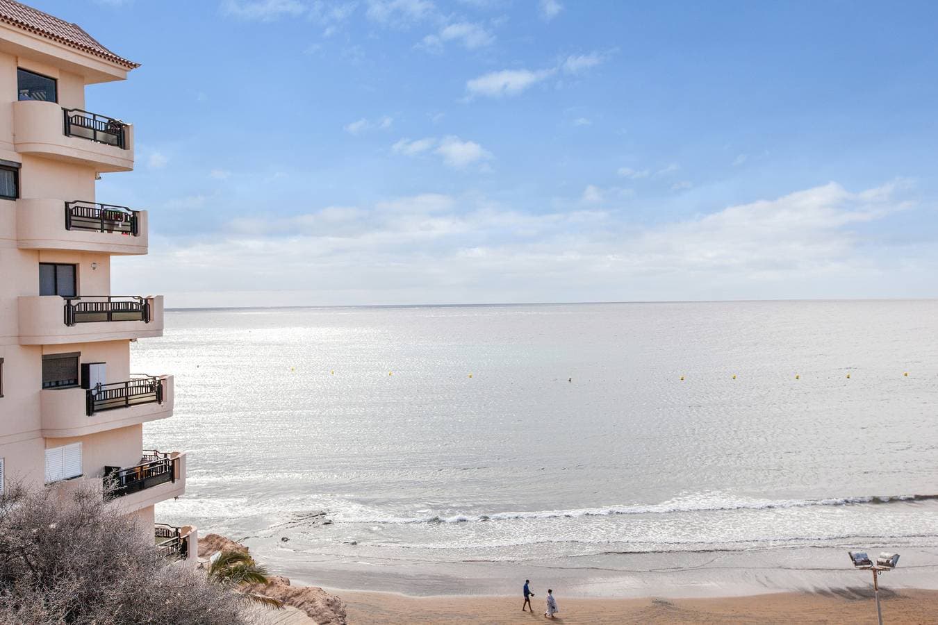 Foto 2 von 22: Ferienwohnung "Casa Médano 18" mit Blick auf das Meer und die Berge und WLAN