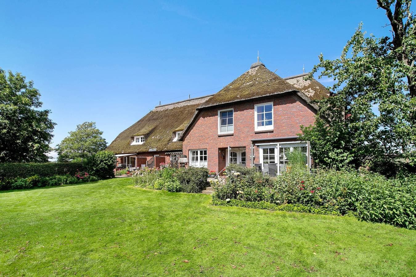 Foto 7 von 38: Ferienwohnung 'Ferienhof Jacobsen 2' mit gemeinsamer Terrasse, gemeinsamem Garten und WLAN