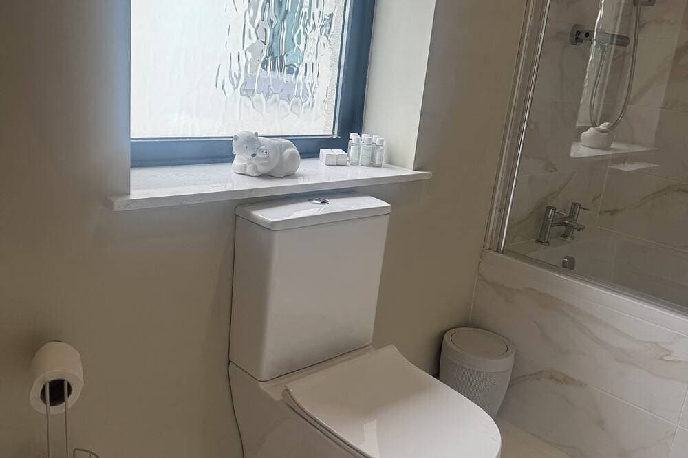 Foto 4 von 18: The Back Bay Apartment @ Milton on The Moyle