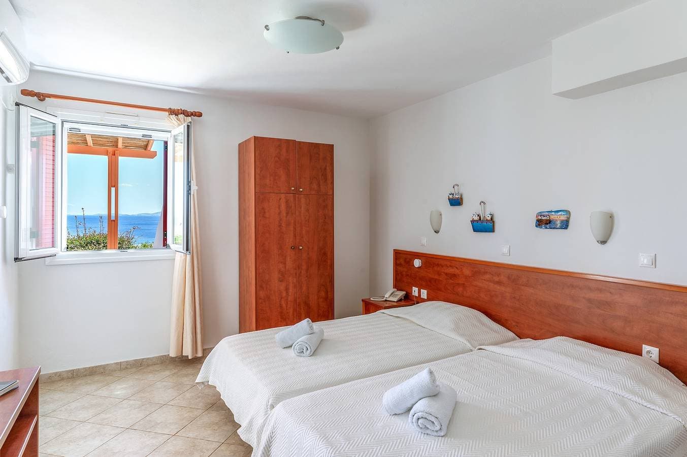 Foto 9 von 20: Ferienhaus 'Anemologio 202 Studio Tinos' mit Meerblick, WLAN und Klimaanlage