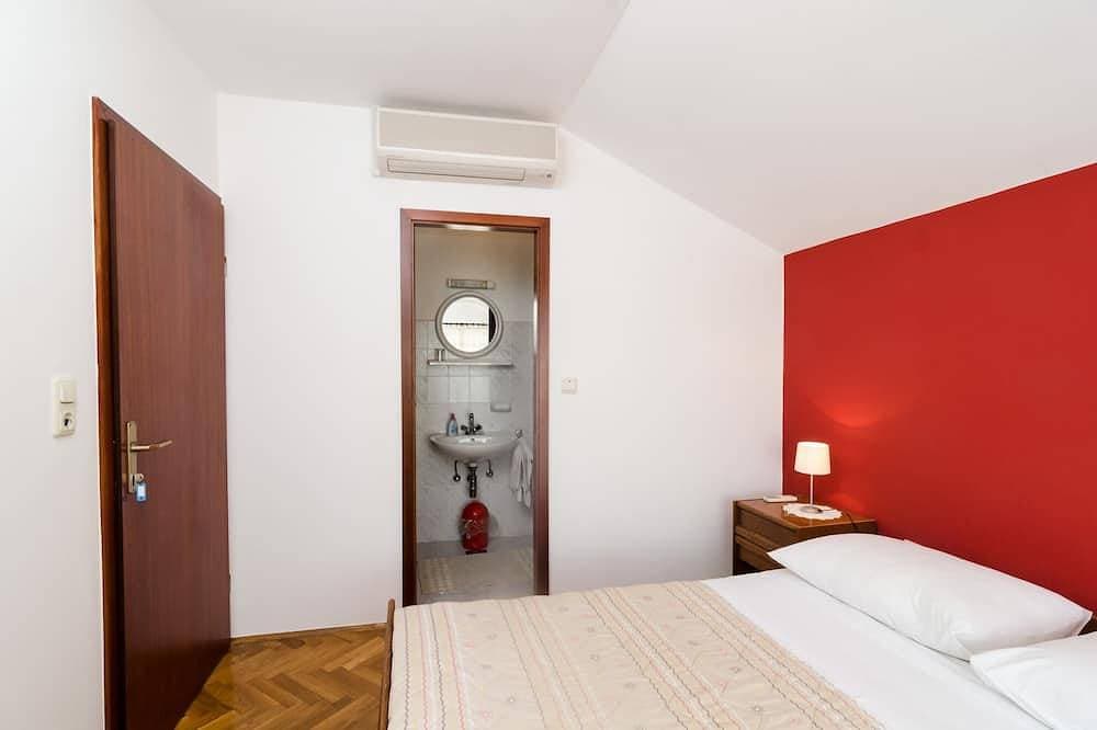 Foto 5 von 15: Guesthouse Moretic - Doppelzimmer mit Gartenblick 1
