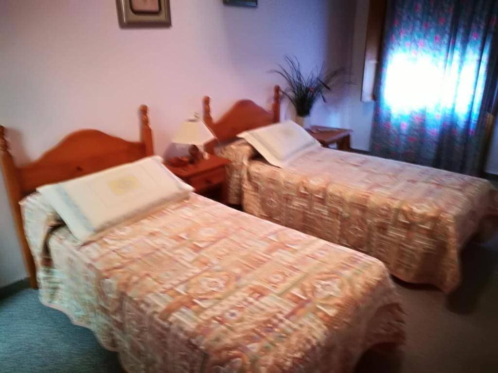 Foto 3 von 21: Double Room with Shared Bathroom