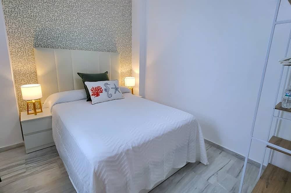 Foto 4 von 30: Sol Suites Apartment with a Balcony