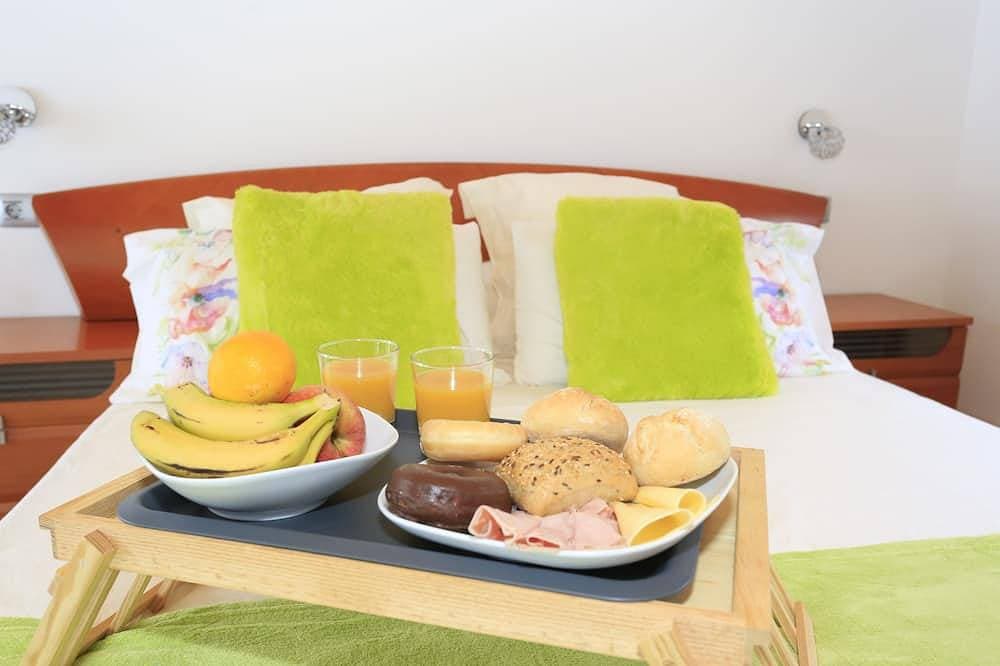 Foto 9 von 30: Einzelhaus mit 3 Schlafzimmern, 3 Bädern, Wohnzimmer, Küche, Garten