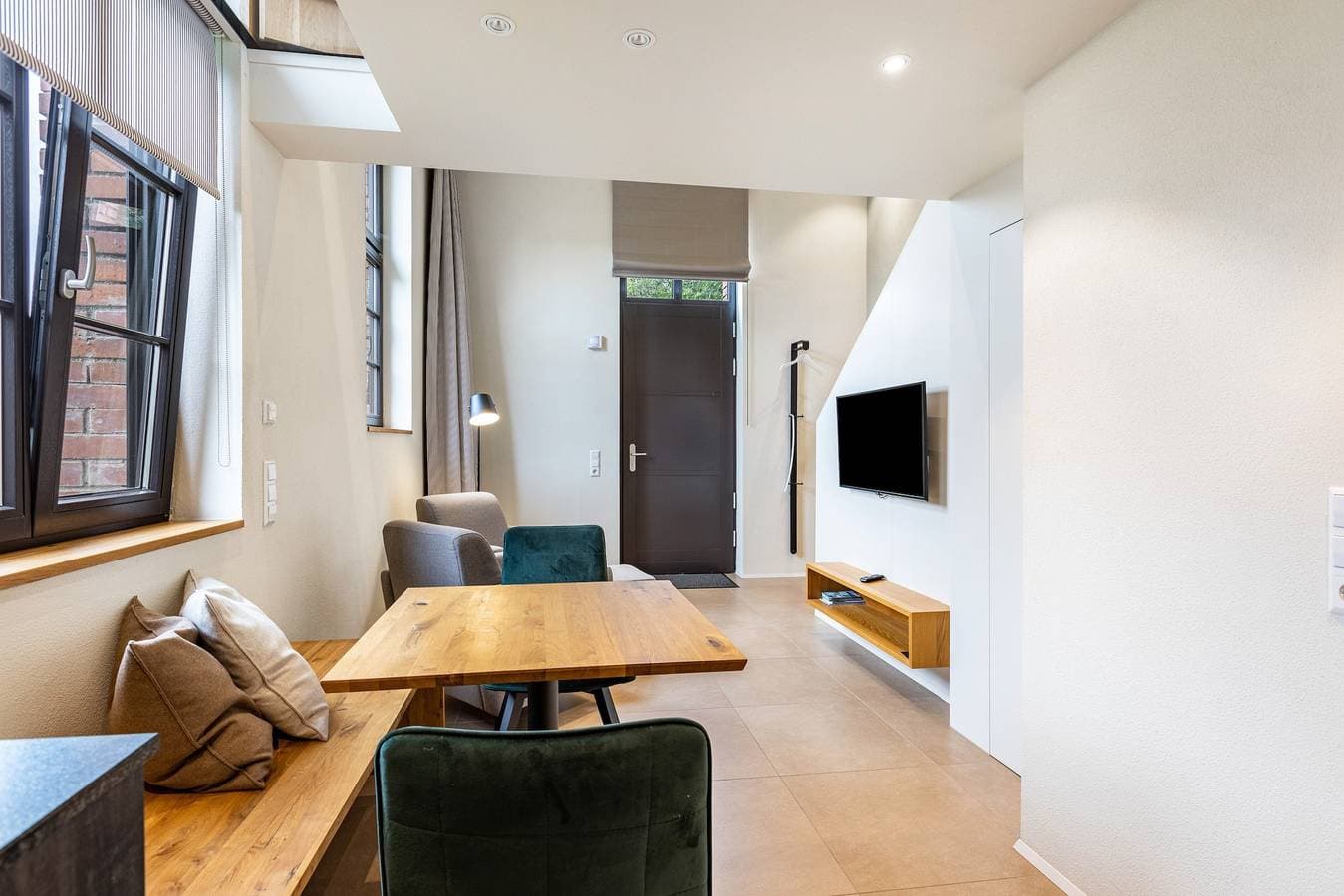Foto 3 von 23: Premium Ferienwohnung 'Daube' mit Privatterrasse, Gemeinschaftsgarten und Wi-Fi