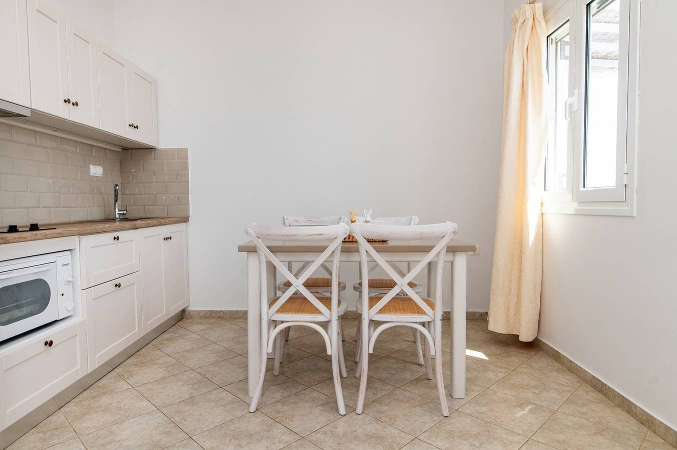 Foto 7 von 26: Ferienhaus 'Anemologio 303 Tinos' mit Meerblick, WLAN und Klimaanlage
