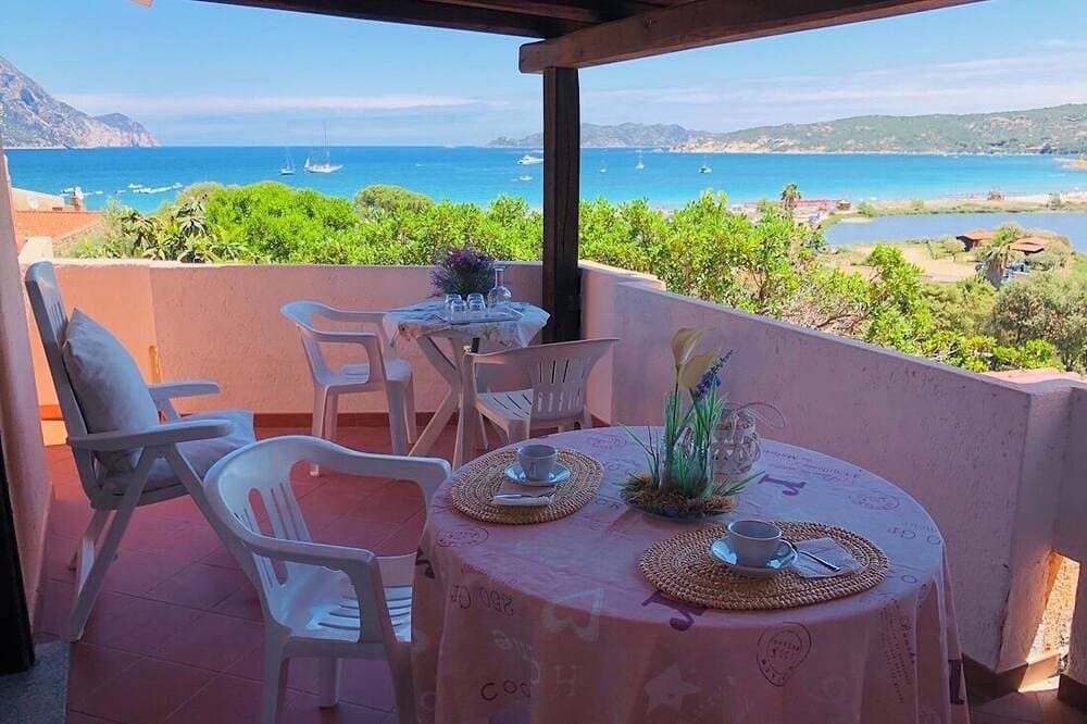 Two-room apartment Oleander Sea view 250 mt beach Porto Taverna 1