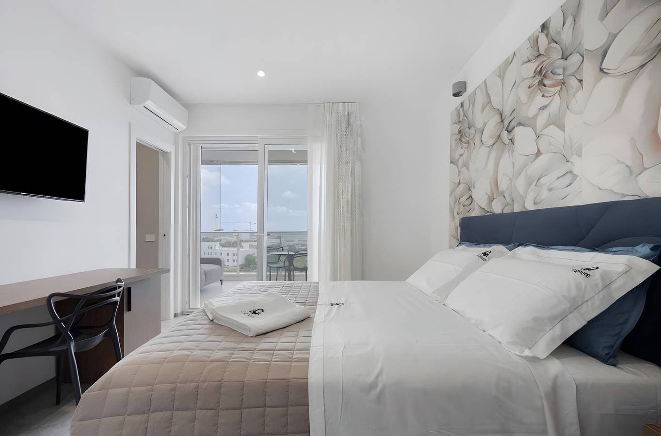 Foto 2 von 27: Apartment 'U Gnore - Zimmer Riccio' mit Meerblick, WLAN und Klimaanlage