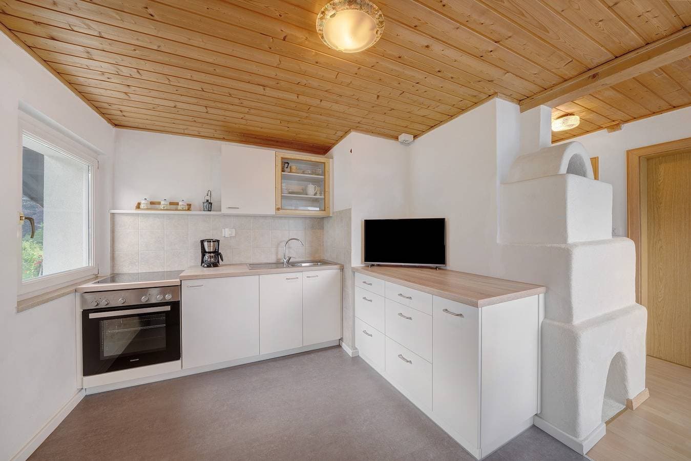 Foto 4 von 19: Ferienwohnung "Bergblick" mit Dachterrasse, Garten mit Pool