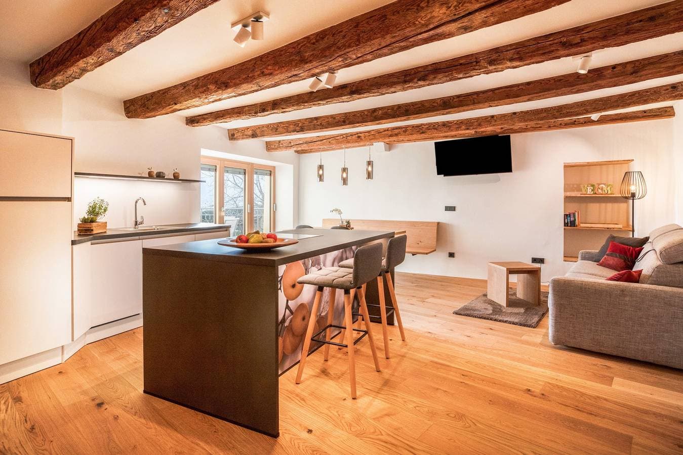 Foto 3 von 37: Brantenhof Design-Ferienwohnung "Pomum“ mit Gemeinschaftsgarten mit Sauna, Balkon und WLAN