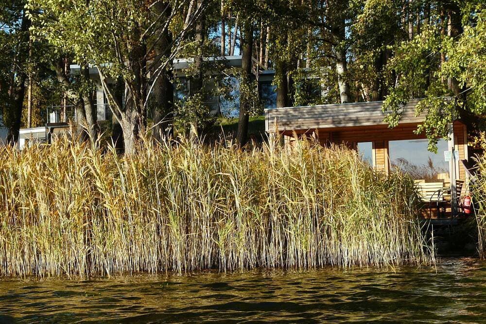 Foto 11 von 29: Luxus-Ferienhaus direkt am See, naturnaher Komfort in modernem Stil