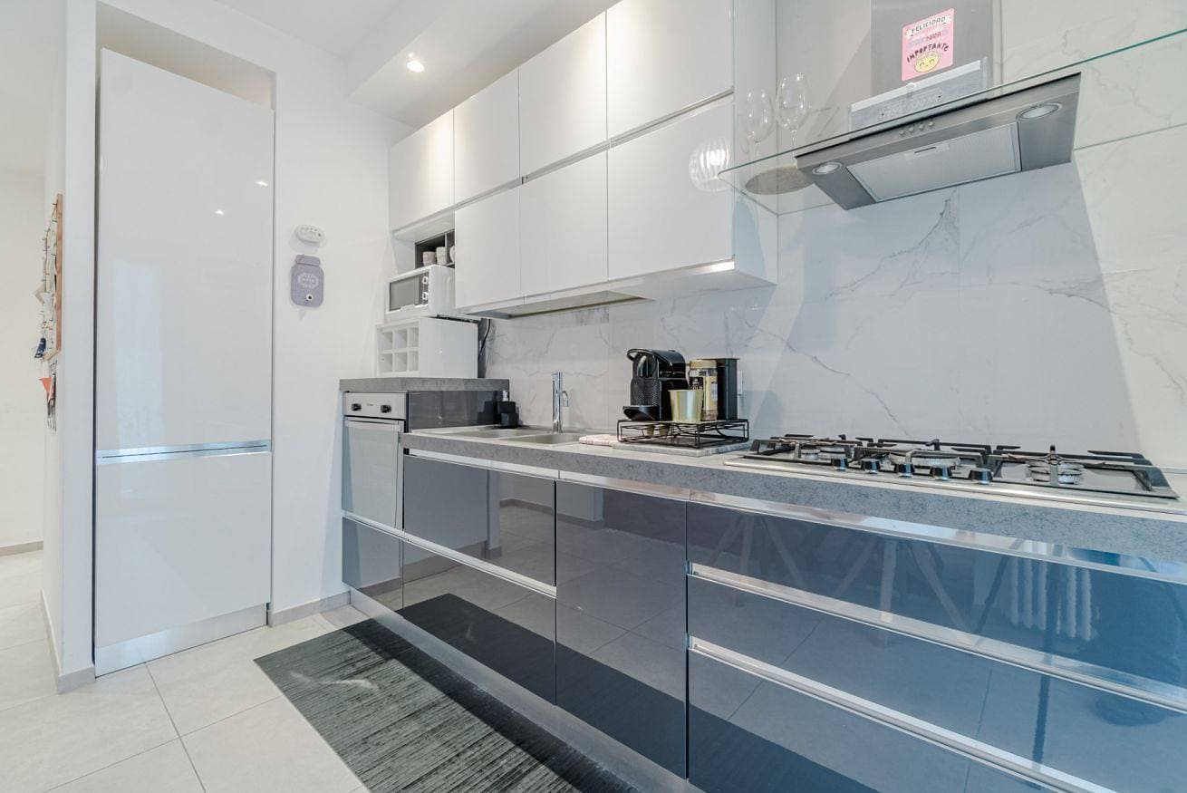 Foto 6 von 27: GuestHost - Elegant Loft x4 - a 500m da Porta Nuova