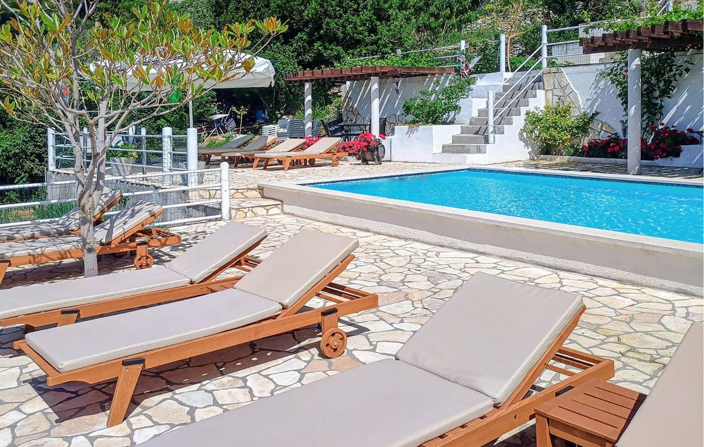 Gemütliche Ferienwohnung in der Nähe des Juto-Strandes mit Pool und WLAN 1