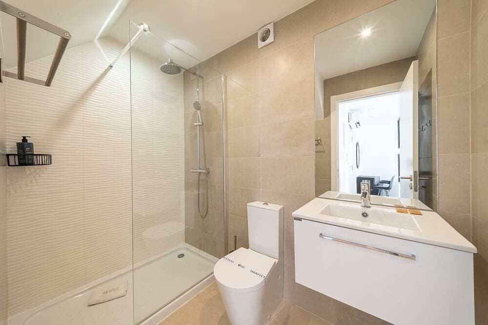 Foto 11 von 26: GuestReady - Carolina Building: Erdgeschoss Rechts