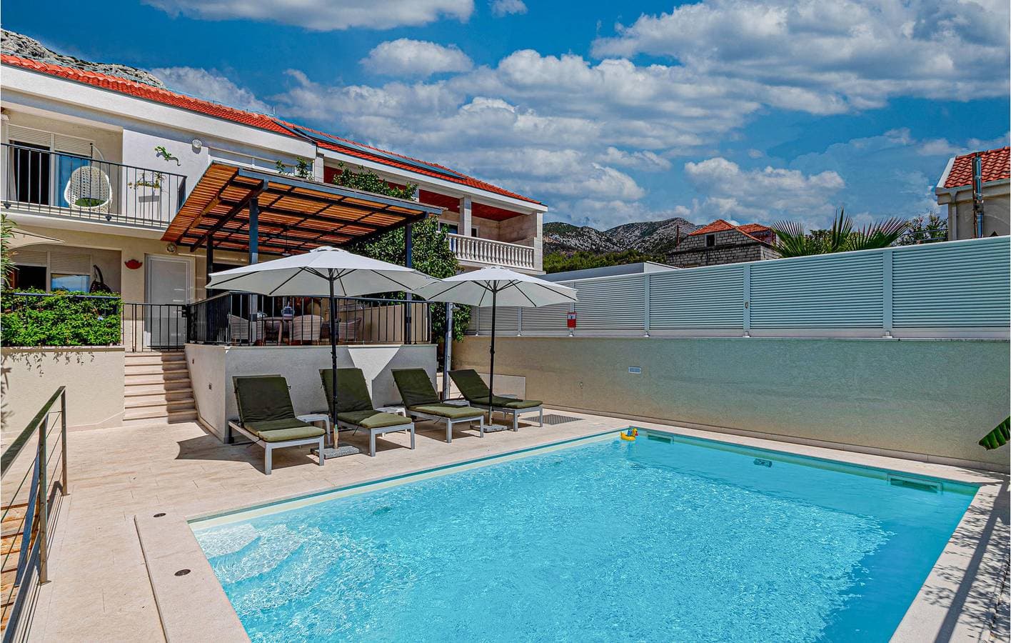 Foto 10 von 50: Reizende 2-Zimmer-Wohnung mit Pool in Strandnähe – WLAN & Terrasse
