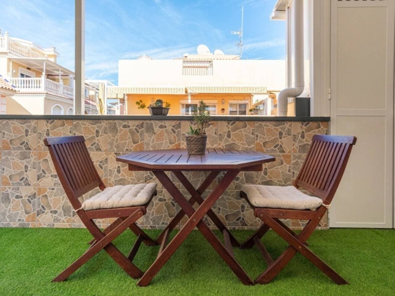 Foto 4 von 21: Wohnung mit Terrasse nahe am Strand, Parkplatz enthalten