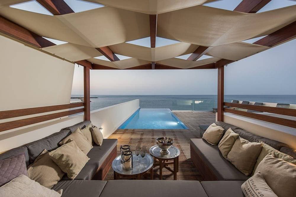 Celestine, beach front villa with roof top pool and spectacular views. 1