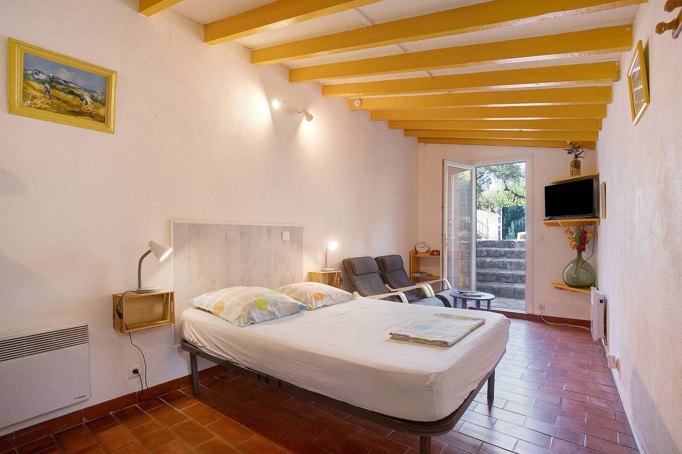 Foto 4 von 34: Einzimmerapartment 'Meublé' mit Gemeinschaftspool, privatem Garten und WLAN