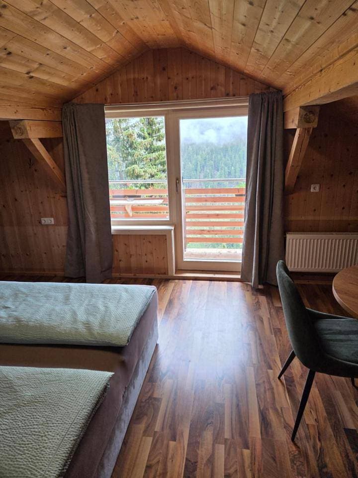 Foto 6 von 15: Triple Room with Shared Bathroom