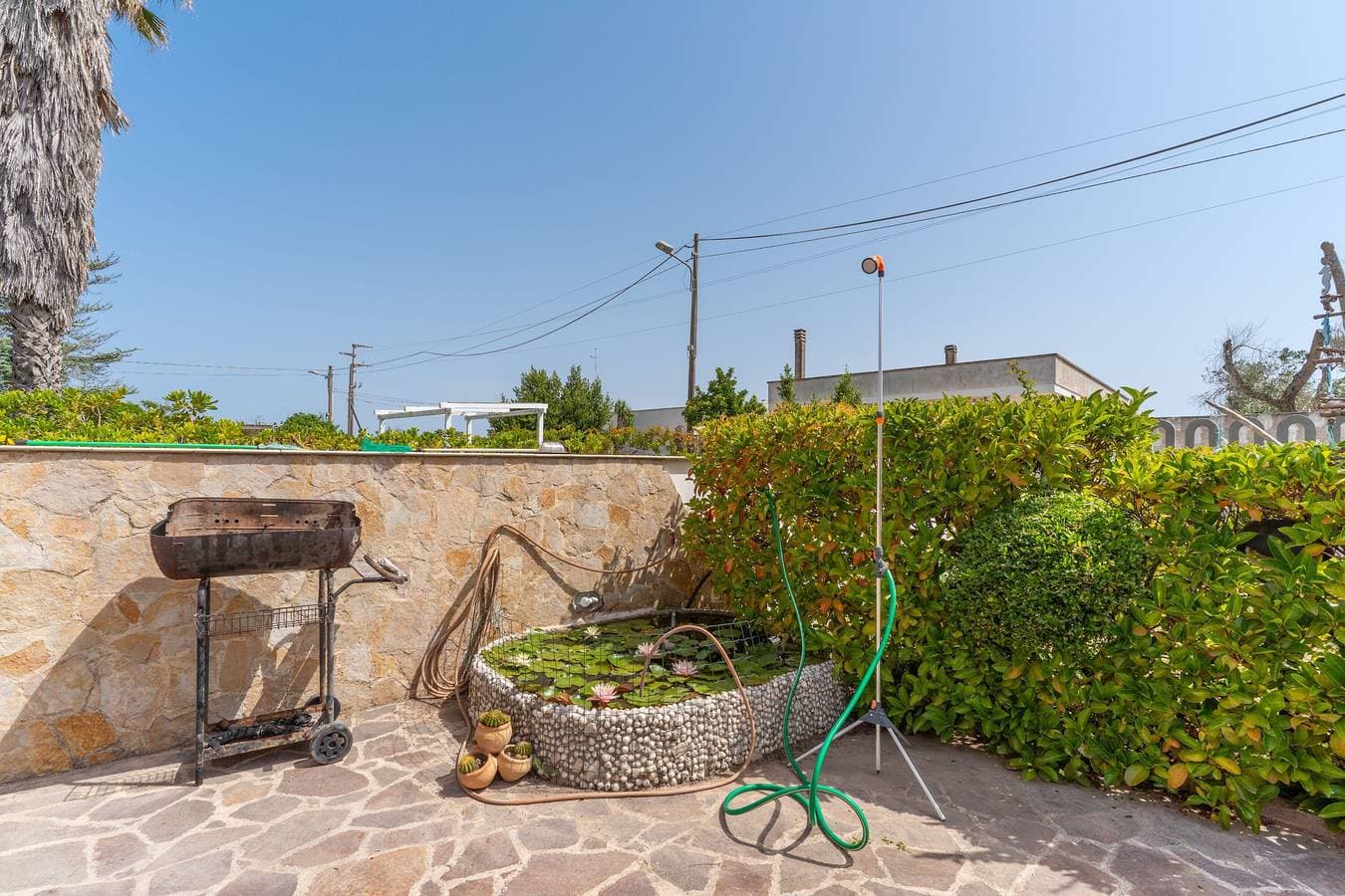 Foto 5 von 25: Ferienwohnung Amare 1 in Strandnähe mit überdachter Terrasse und Garten
