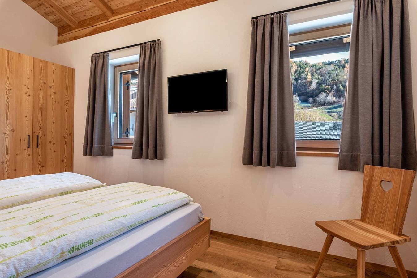 Foto 11 von 31: Ferienwohnung "Guntschöllerhof Völseggspitze" mit Bergblick, WLAN, Balkon und Garten