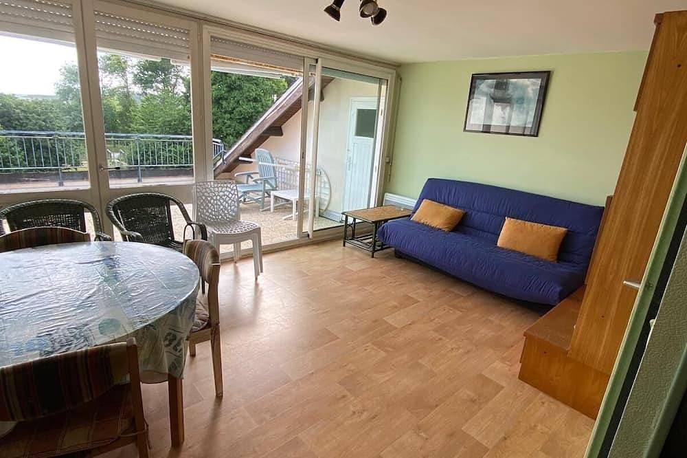 Foto 11 von 28: Apartment with beautiful view over a wooded park and a large terrace