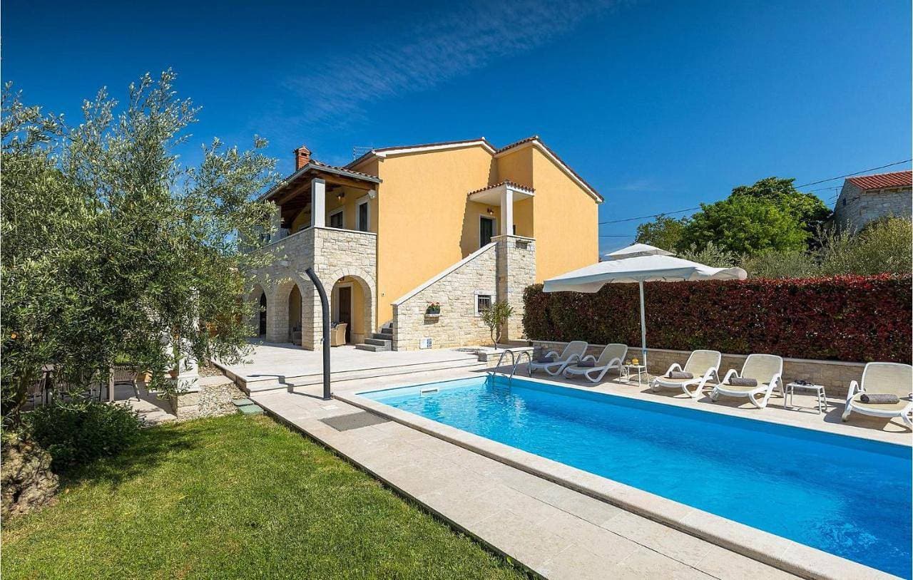 Foto 5 von 32: Four-Bedroom Holiday Home